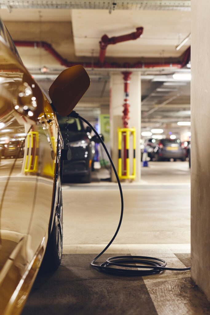 Electric car charging in car park